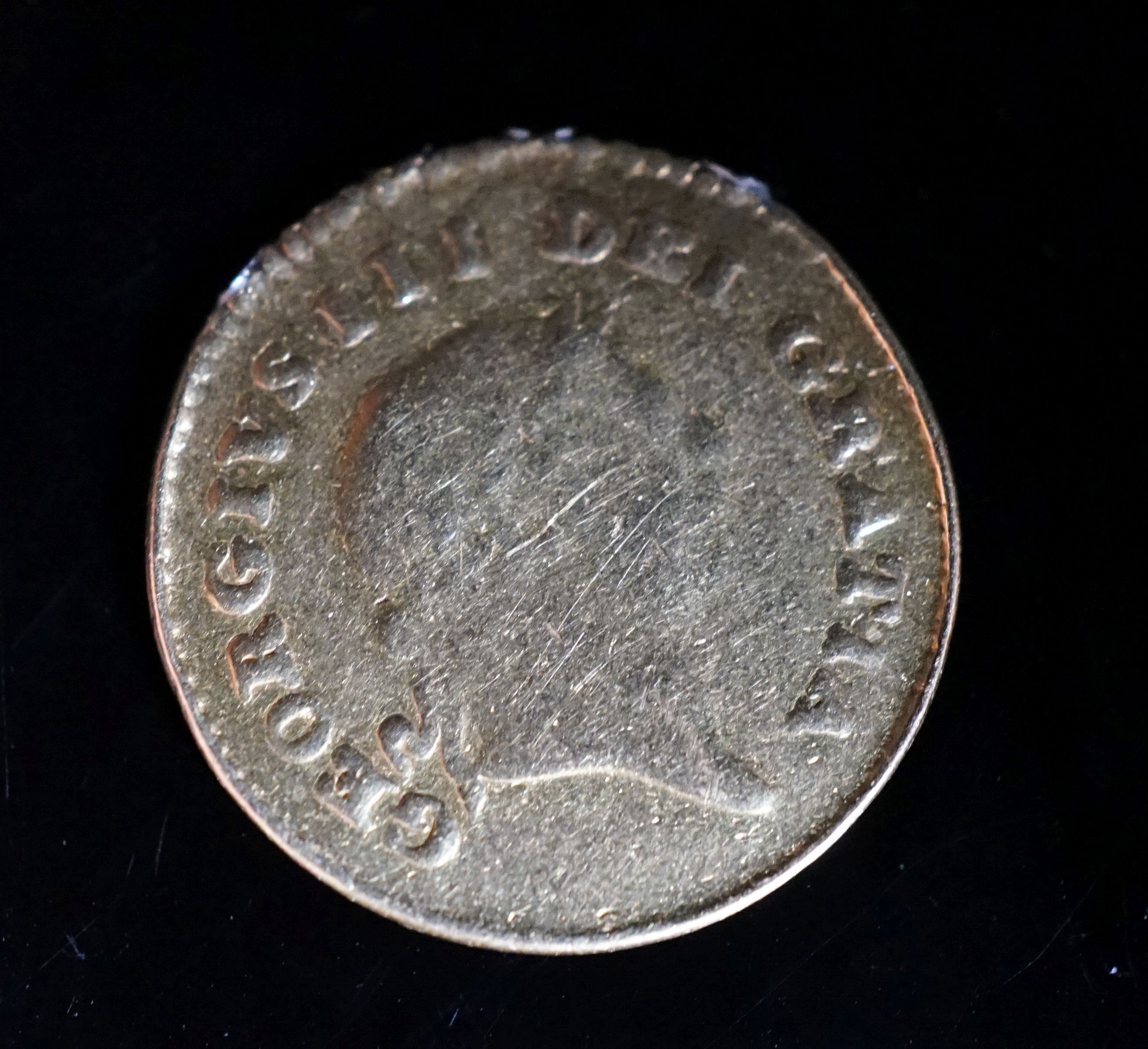 A George III 1809 gold one third guinea coin.